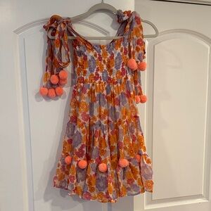 Vibrant Floral Mini Dress with Pom-Poms